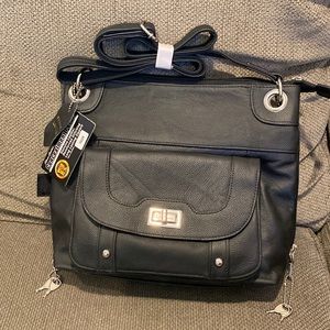 CCW concealment purse for hand gun. Brand new! Genuine leather